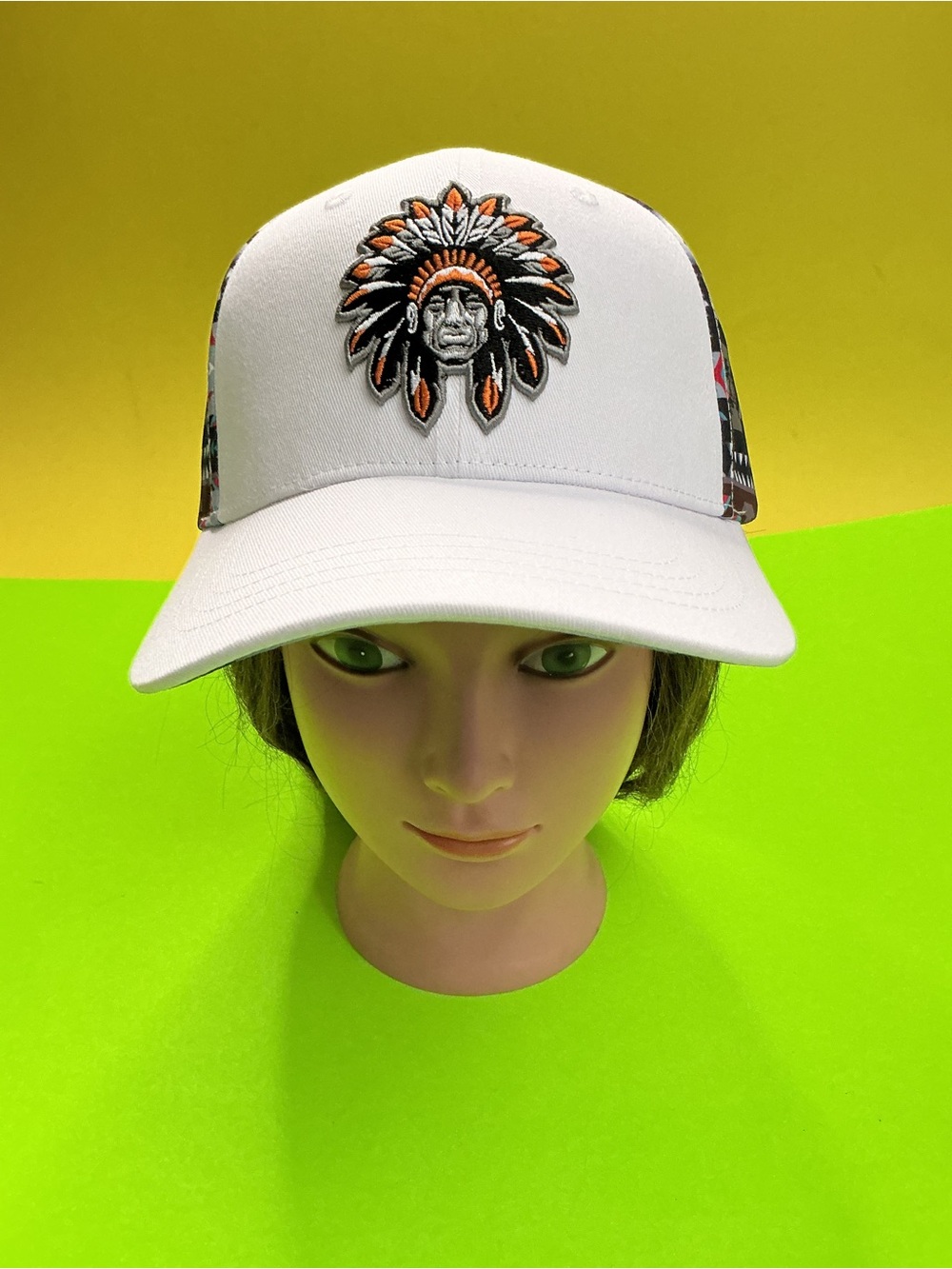 White Trucker Hat with Orange and Black Headdress Patch